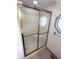 Bathroom with a shower featuring sliding glass doors and an octagon window at 3975 Keyway Dr, Greenwood, IN 46143