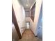 Carpeted steps with wood railing lead down to the lower level at 3975 Keyway Dr, Greenwood, IN 46143