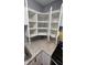 Corner kitchen storage with white cabinets, granite countertop and easy access to appliances at 4614 Runyon Lake W Dr, Greenwood, IN 46143