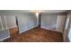 Spacious living room with hardwood floors and plenty of natural light at 4614 Runyon Lake W Dr, Greenwood, IN 46143