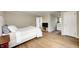 Bright bedroom with hardwood floors, closet and ensuite bathroom access at 5430 N Kenwood Ave, Indianapolis, IN 46208