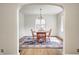 Charming dining room with hardwood floors, and lots of natural light, perfect for Gathering dinners at 5430 N Kenwood Ave, Indianapolis, IN 46208