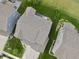 Bird's eye view of the roof, lush greenery, and surrounding homes in a quiet neighborhood at 5473 Forest Glen Dr, Brownsburg, IN 46112