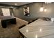 Finished basement features a bar with seating and game area at 5473 Forest Glen Dr, Brownsburg, IN 46112