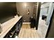 Finished basement bar with stylish wine rack and counter space at 5473 Forest Glen Dr, Brownsburg, IN 46112