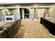 Spacious basement with a fireplace, an entertainment area, a ping pong table, and a stylish wine storage at 5473 Forest Glen Dr, Brownsburg, IN 46112
