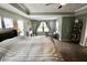 Spacious bedroom with comfortable sitting area and abundant natural light at 5473 Forest Glen Dr, Brownsburg, IN 46112