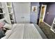 Comfortable bedroom with closet, neutral decor, and adjoining doorway at 5473 Forest Glen Dr, Brownsburg, IN 46112