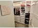 Walk-in closet with custom shelving and drawers for optimal storage and organization at 5473 Forest Glen Dr, Brownsburg, IN 46112