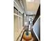 Bright entryway with storage cubbies, a staircase, and hardwood floors at 5473 Forest Glen Dr, Brownsburg, IN 46112