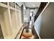 Welcoming entryway featuring built-in storage and a staircase leading to the upper level at 5473 Forest Glen Dr, Brownsburg, IN 46112
