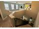 Inviting foyer with stairs leading to a living area with natural light and neutral decor, offering a warm welcome at 5473 Forest Glen Dr, Brownsburg, IN 46112