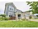 Two-story home with a two-car garage, a beautiful lawn, and well-placed landscaping at 5473 Forest Glen Dr, Brownsburg, IN 46112