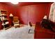Home office with paneled walls, an executive desk, and comfortable seating at 5473 Forest Glen Dr, Brownsburg, IN 46112