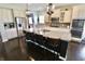 Stylish kitchen with granite countertops, stainless steel appliances, and modern pendant lighting at 5473 Forest Glen Dr, Brownsburg, IN 46112