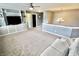 Spacious living area with built-in shelves and modern ceiling fan at 5473 Forest Glen Dr, Brownsburg, IN 46112
