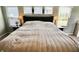 Bright bedroom features a large bed and plenty of natural light at 5473 Forest Glen Dr, Brownsburg, IN 46112