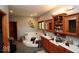 Spacious bathroom featuring a jacuzzi tub, wooden cabinets, and ample counter space at 5586 S 200 E, Franklin, IN 46131
