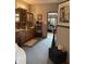 Well-lit bathroom with wood cabinets and access to the bedroom at 5586 S 200 E, Franklin, IN 46131