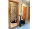 Hallway leading to the bathroom with a toilet and white tile flooring at 5586 S 200 E, Franklin, IN 46131