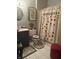 Whimsical bathroom featuring a vanity, toilet, and shower with playful decor at 5586 S 200 E, Franklin, IN 46131