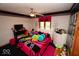 Stylish bedroom with unique decor, a ceiling fan, and bright accents at 5586 S 200 E, Franklin, IN 46131