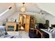 Attic bedroom with a fireplace, sloped ceilings and an adjacent office/sitting area at 5586 S 200 E, Franklin, IN 46131