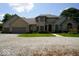 Charming two-story home with a three-car garage, manicured lawn, and a circular driveway at 5586 S 200 E, Franklin, IN 46131