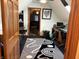 Cozy home office featuring a modern rug, a work space, and a bonus room beyond the doorway at 5586 S 200 E, Franklin, IN 46131