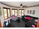 Cozy living room with zebra-print accents, lots of windows, and natural light at 5586 S 200 E, Franklin, IN 46131