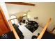 Open-concept living room with high ceilings, a fireplace, and lots of natural light at 5586 S 200 E, Franklin, IN 46131