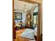 Office featuring hardwood floors, desk, and unique grandfather clock, with lots of natural light at 5586 S 200 E, Franklin, IN 46131