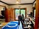 Spacious office with Colts decor, view of deck, and ample seating at 5586 S 200 E, Franklin, IN 46131