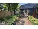 Side entrance leading to a screened-in porch with beautiful yard views at 5631 Shelby St, Indianapolis, IN 46227