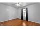 Light-filled bedroom featuring hardwood floors, neutral walls, and natural light at 5631 Shelby St, Indianapolis, IN 46227