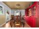 Inviting dining room with wood table, chairs, and a built-in hutch for ample storage at 5631 Shelby St, Indianapolis, IN 46227
