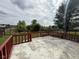 Large backyard with a fenced yard, patio and playground at 621 Appleseed Way, Indianapolis, IN 46217