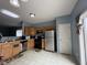 Updated kitchen featuring stainless steel appliances and light wood cabinets at 621 Appleseed Way, Indianapolis, IN 46217