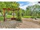 Backyard deck featuring a pergola that provides shade and seating, perfect for outdoor relaxation at 6329 Whitaker Farms Dr, Indianapolis, IN 46237