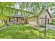Traditional two-story home featuring a covered front porch and a lush, green lawn at 6329 Whitaker Farms Dr, Indianapolis, IN 46237