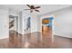 Open hallway provides access to several rooms including a bathroom, the kitchen, and an upstairs staircase at 6329 Whitaker Farms Dr, Indianapolis, IN 46237