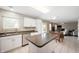 Open concept kitchen with stainless steel appliances, a kitchen island, and view to the Gathering room at 6562 Quail Run, Fishers, IN 46038