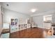 Spacious playroom with hardwood floors, natural light, and built-in storage at 6562 Quail Run, Fishers, IN 46038