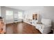 Bright playroom with hardwood floors, ample storage, and natural light at 6562 Quail Run, Fishers, IN 46038