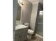 Bathroom featuring a vanity, toilet, and shower with sliding glass doors at 6932 Deerbrook Ct, Indianapolis, IN 46214