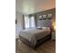 Spacious bedroom featuring a large bed, neutral color palette, and great natural light at 6932 Deerbrook Ct, Indianapolis, IN 46214