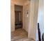 Inviting entryway featuring a decorative coat rack with bench and storage baskets at 6932 Deerbrook Ct, Indianapolis, IN 46214