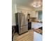 Bright kitchen featuring stainless steel appliances, ample countertop space, and modern finishes at 6932 Deerbrook Ct, Indianapolis, IN 46214