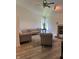 Spacious living room with vaulted ceilings, fireplace and plush neutral colored seating at 6932 Deerbrook Ct, Indianapolis, IN 46214