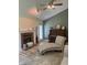 Inviting living room with fireplace, vintage piano and comfortable chaise lounge at 6932 Deerbrook Ct, Indianapolis, IN 46214